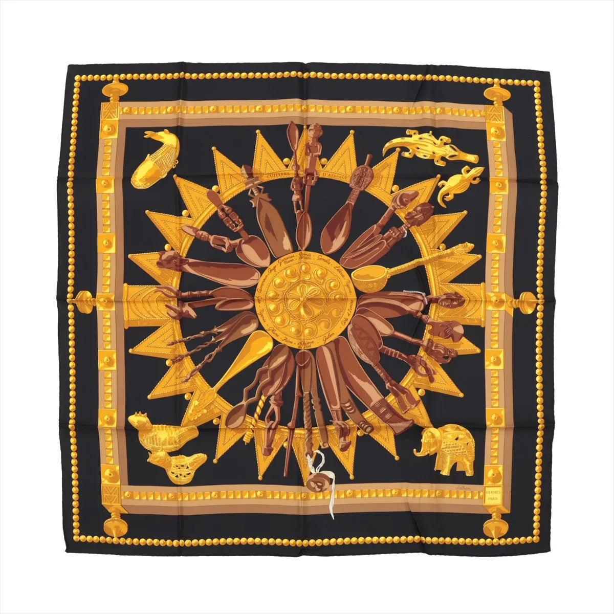 Hermès Carré 90 "Cuillers d’Afrique" silk scarf in black with golden and brown African spoon and sunburst motif framed by a dotted border.