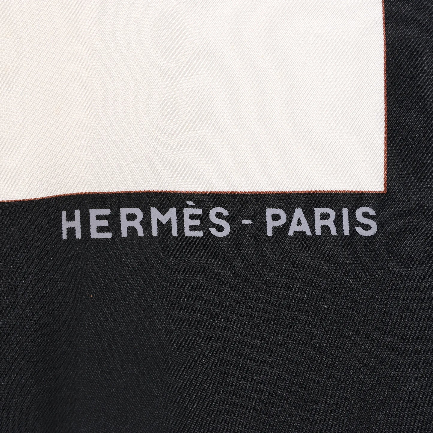 Hermès Carré 90 "CUIRS DU DESERT" Silk handkerchief in Black x Orange