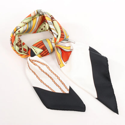 Hermès Carré 90 "CUIRS DU DESERT" Silk handkerchief in Black x Orange