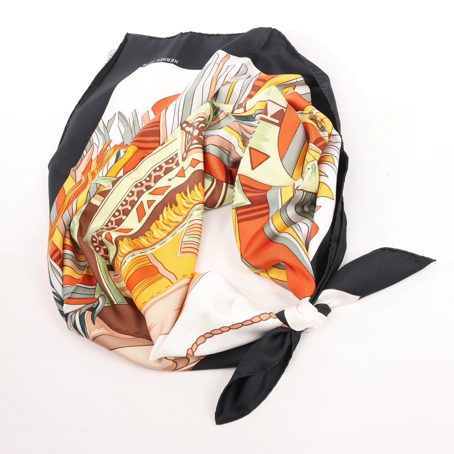 Hermès Carré 90 "CUIRS DU DESERT" Silk handkerchief in Black x Orange