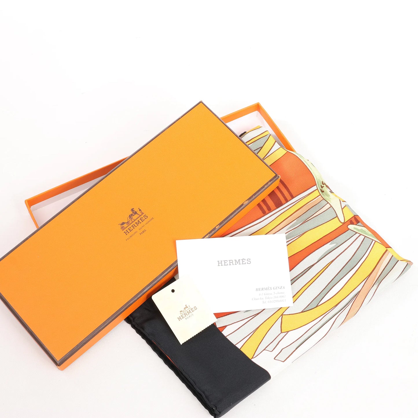 Hermès Carré 90 "CUIRS DU DESERT" Silk handkerchief in Black x Orange