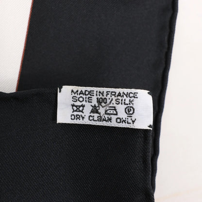 Hermès Carré 90 "CUIRS DU DESERT" Silk handkerchief in Black x Orange