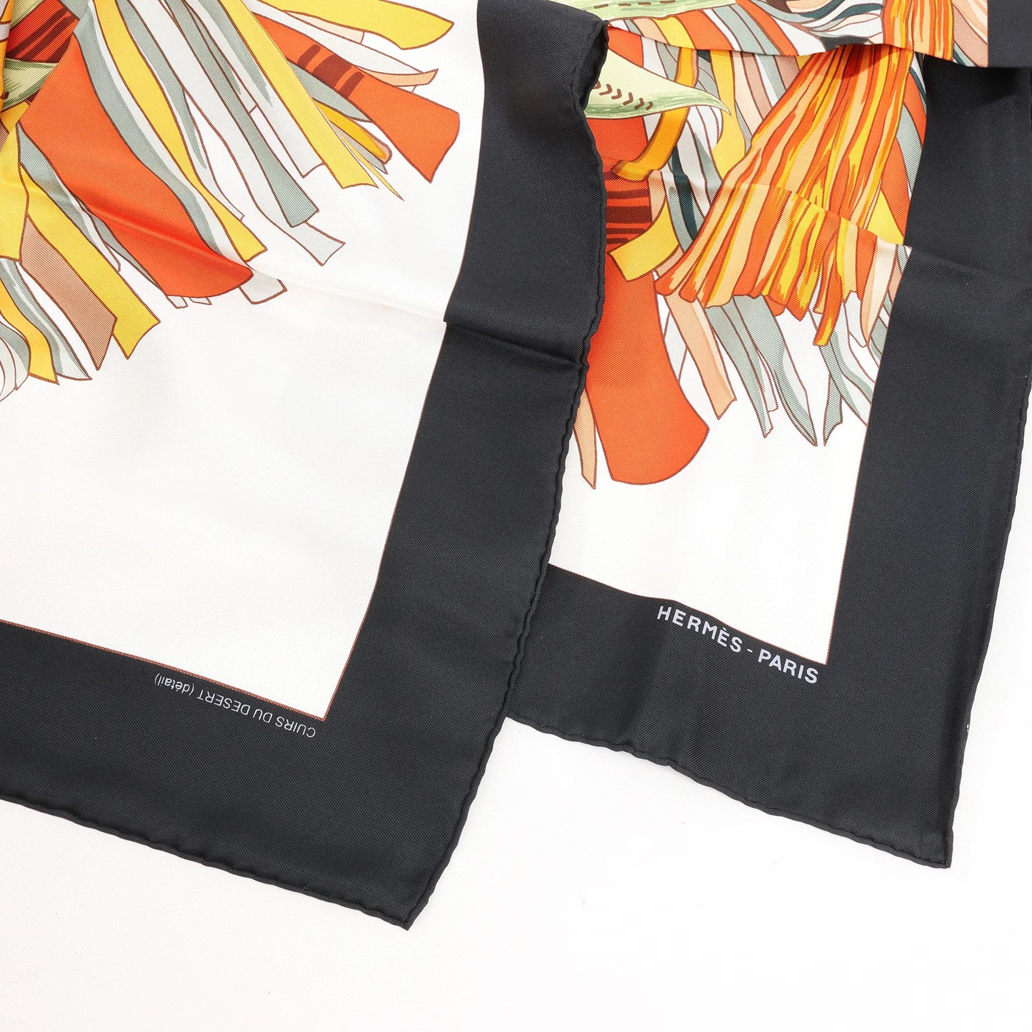 Hermès Carré 90 "CUIRS DU DESERT" Silk handkerchief in Black x Orange