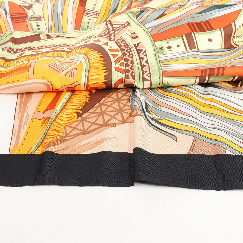 Hermès Carré 90 "CUIRS DU DESERT" Silk handkerchief in Black x Orange