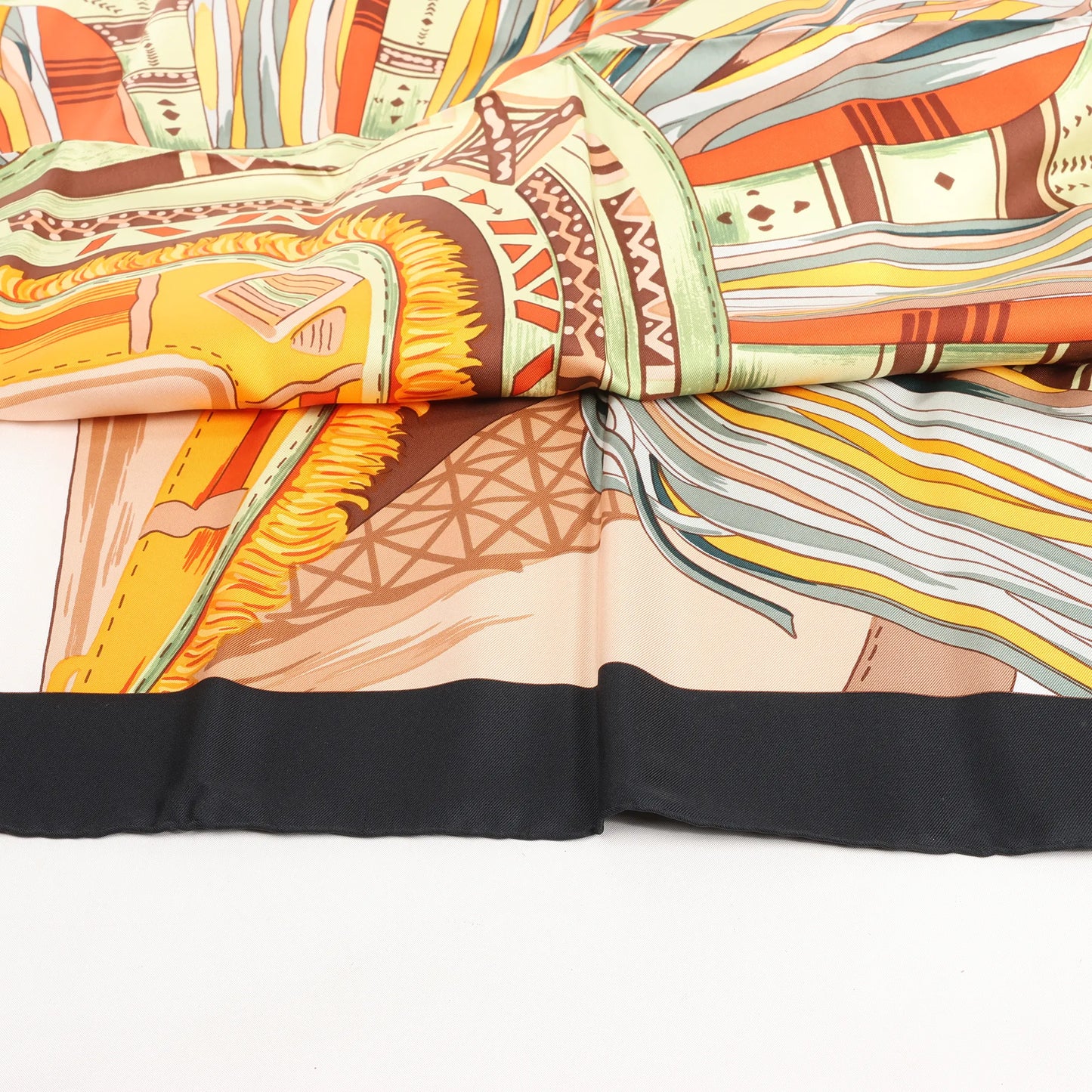 Hermès Carré 90 "CUIRS DU DESERT" Silk handkerchief in Black x Orange