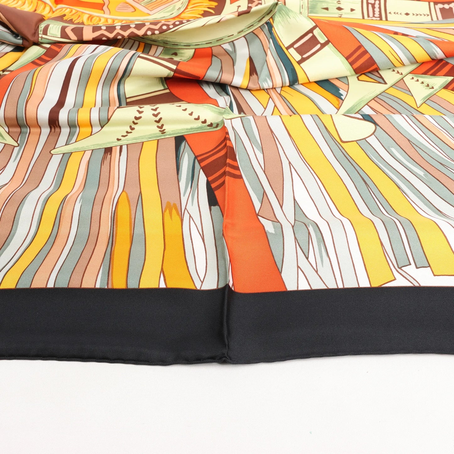 Hermès Carré 90 "CUIRS DU DESERT" Silk handkerchief in Black x Orange