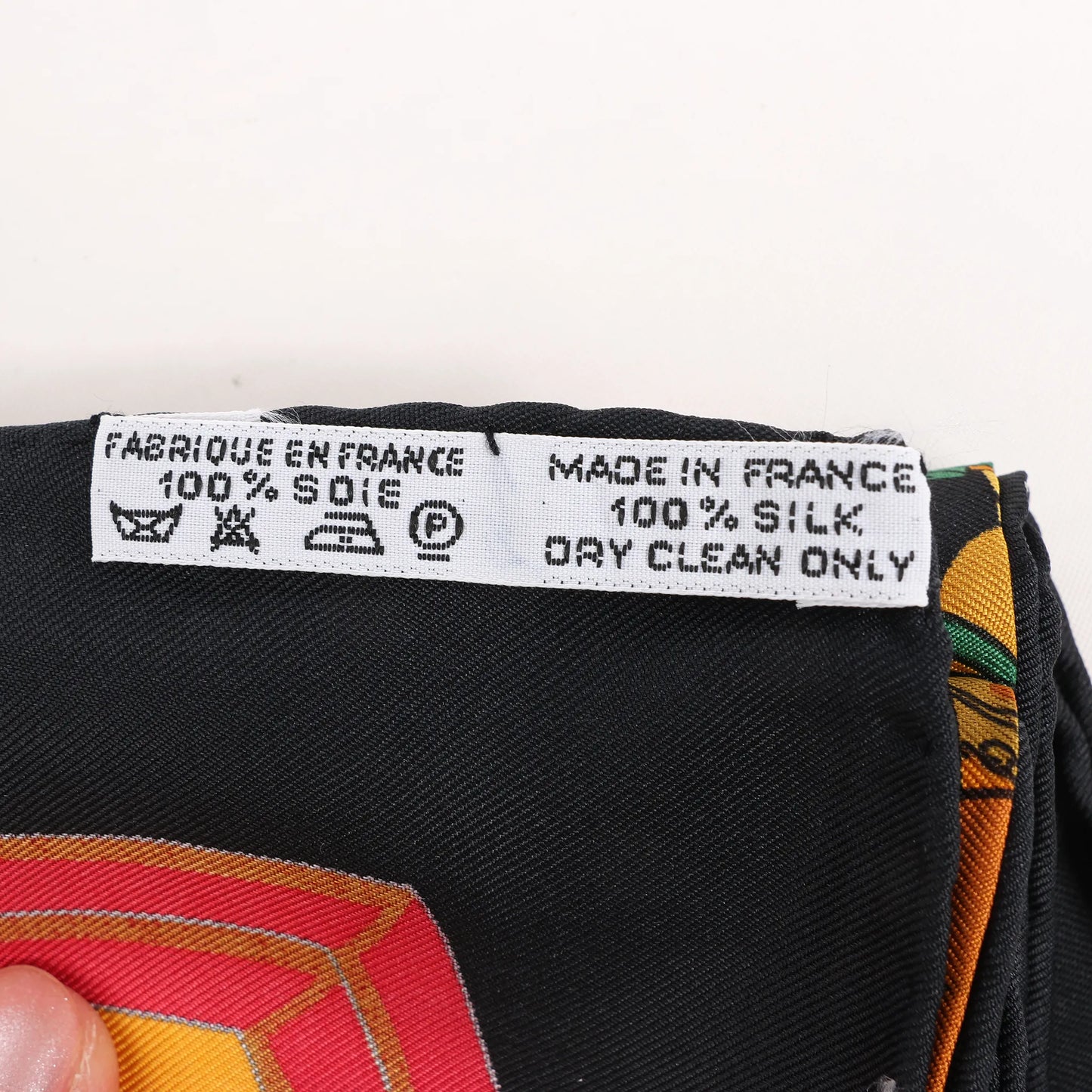 Hermès Carré 90 "Carriage and Hat" Silk handkerchief in Black x Orange