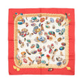 Hermès Carré 90 silk scarf with red border, cream center, colorful egg illustrations and scattered feathers, framed by a braided rope motif on white background