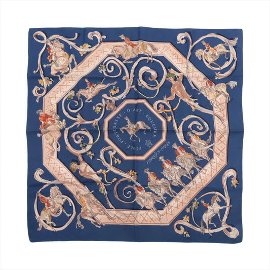Hermès Carré 90 silk scarf in navy blue featuring detailed equestrian artwork with riders and horses, ornate scroll motifs, and “École Portugaise d’Art Équestre” text in the center.