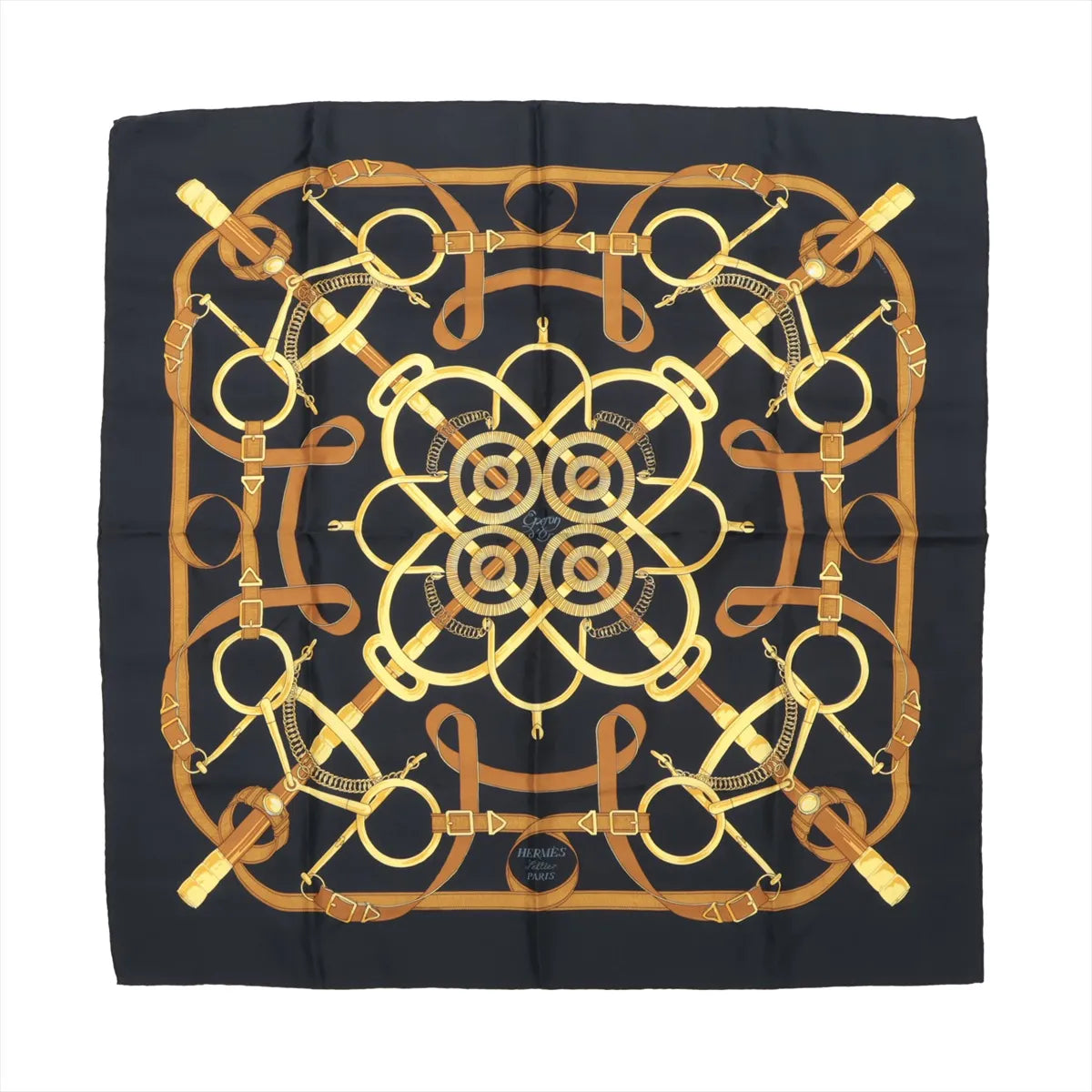 Hermès Carré 90 silk scarf titled "Éperon d'Or," showcasing an intricate pattern of golden stirrups, reins, and leather harnesses arranged in a symmetrical, circular layout on a rich black background, blending equestrian tradition with luxurious detail.