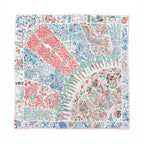 Hermès Carré 90 silk scarf with multicolor floral patchwork design in red, blue, green, and gray tones, finished with a thin pink border on white background