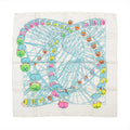 Hermès Carré 90 "Grande Roue" silk handkerchief in white and light blue, depicting a large Ferris wheel with pastel-colored gondolas in pink, green, yellow, orange, and blue, laid flat against a white background.
