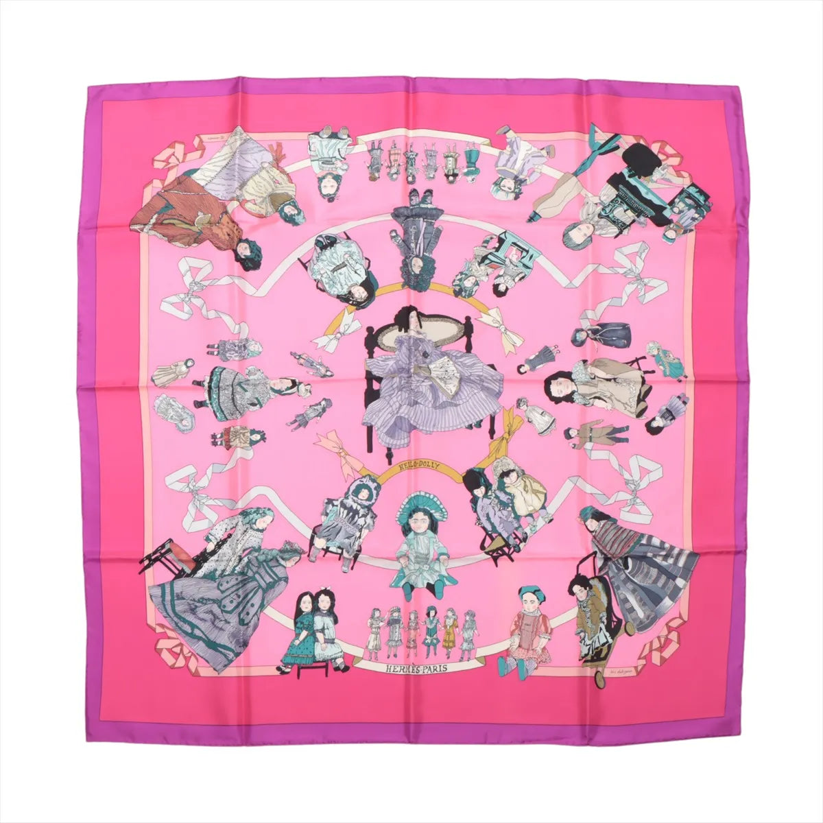 Hermès Carré 90 "HELLO DOLLY" silk scarf in pink featuring detailed illustrations of antique dolls, toys, and ribbon accents with a bold fuchsia border and central seated doll design, laid flat against a white background.