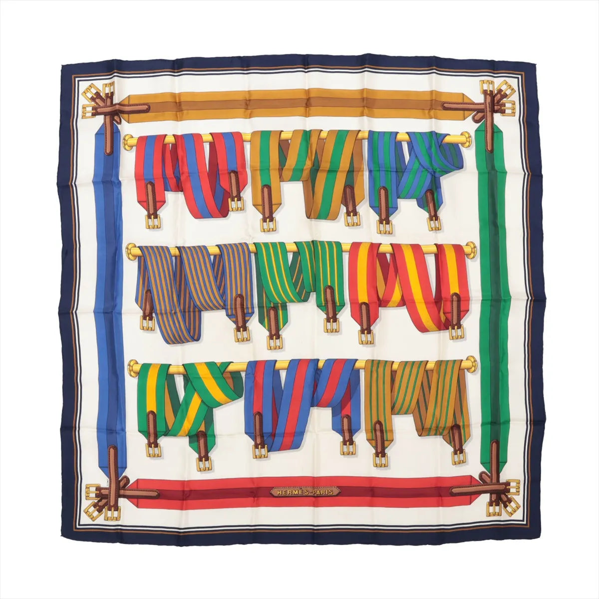 Hermès Carré 90 silk scarf titled "Les Sangles," showcasing rows of multicolored striped belts and straps in red, green, blue, and yellow tones, neatly arranged on gold rods against a cream background, bordered with navy, red, and green ribbon detailing.
