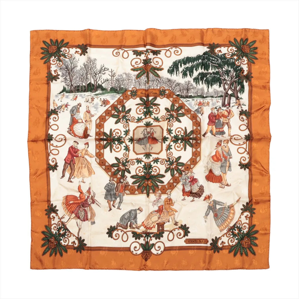 Hermès Carré 90 brown and ivory silk scarf with illustrated winter scenes, dancing figures, snowy trees and ornate green botanical scrollwork.