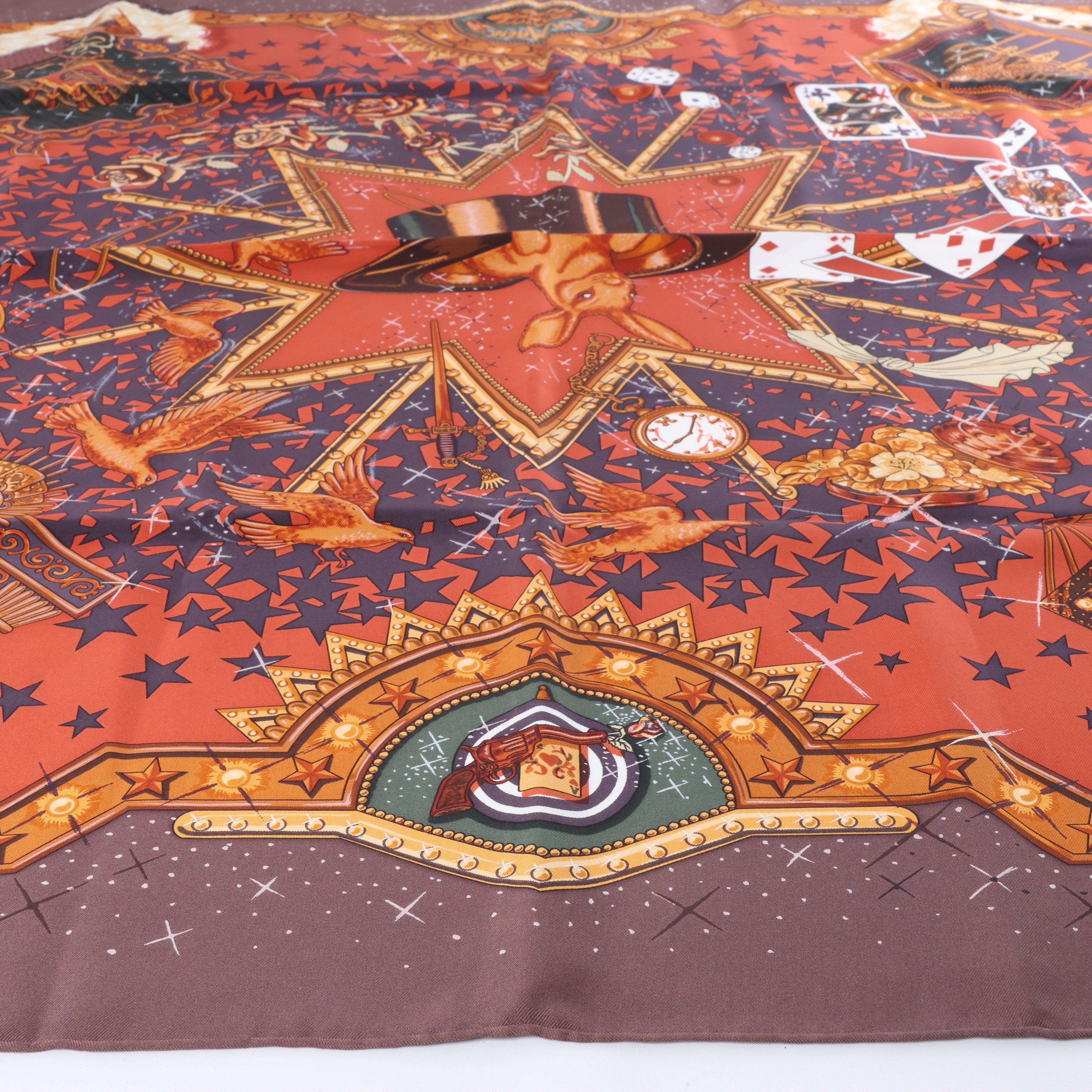 Hermès Carré 90 "LA MAGIE" Silk handkerchief in Brown
