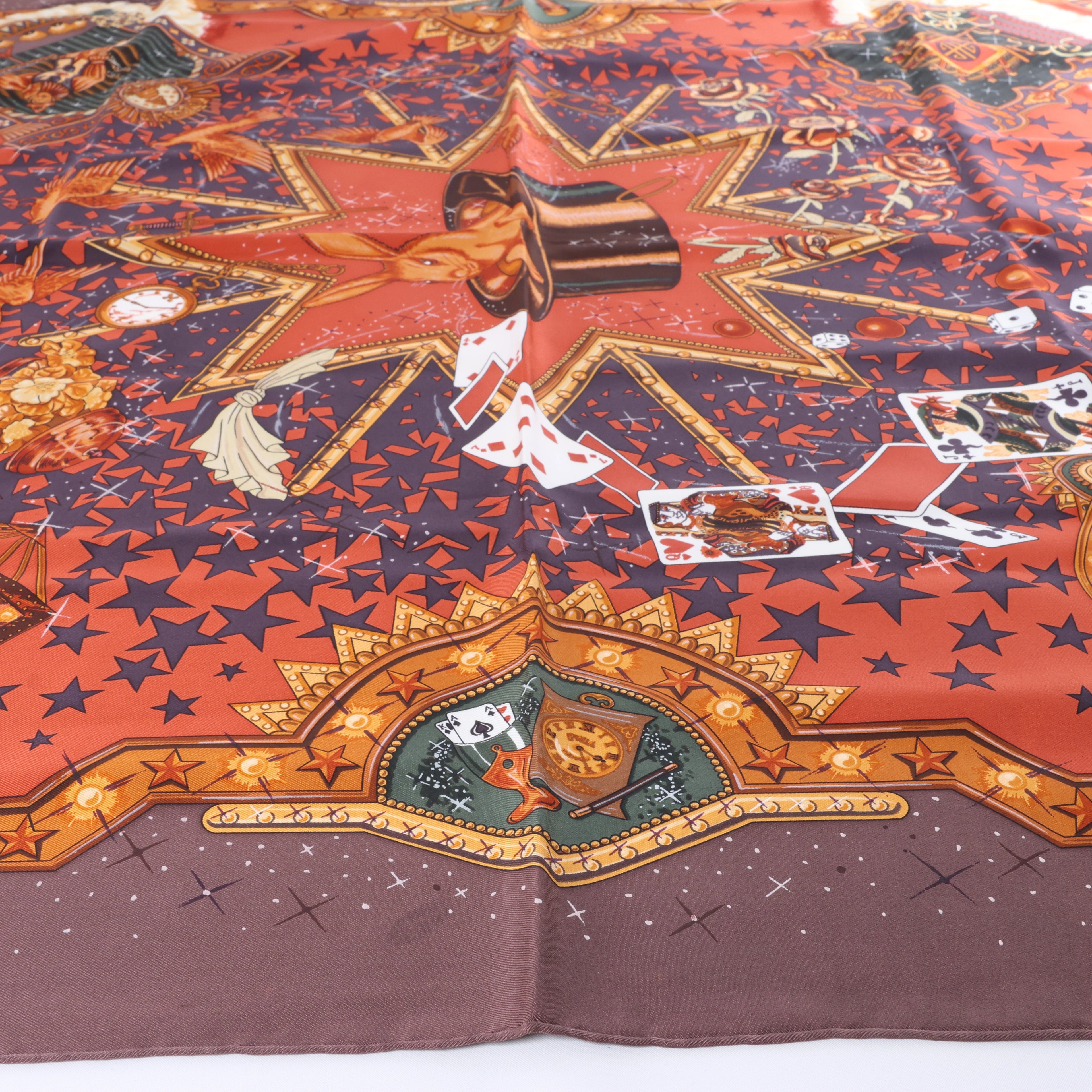 Hermès Carré 90 "LA MAGIE" Silk handkerchief in Brown