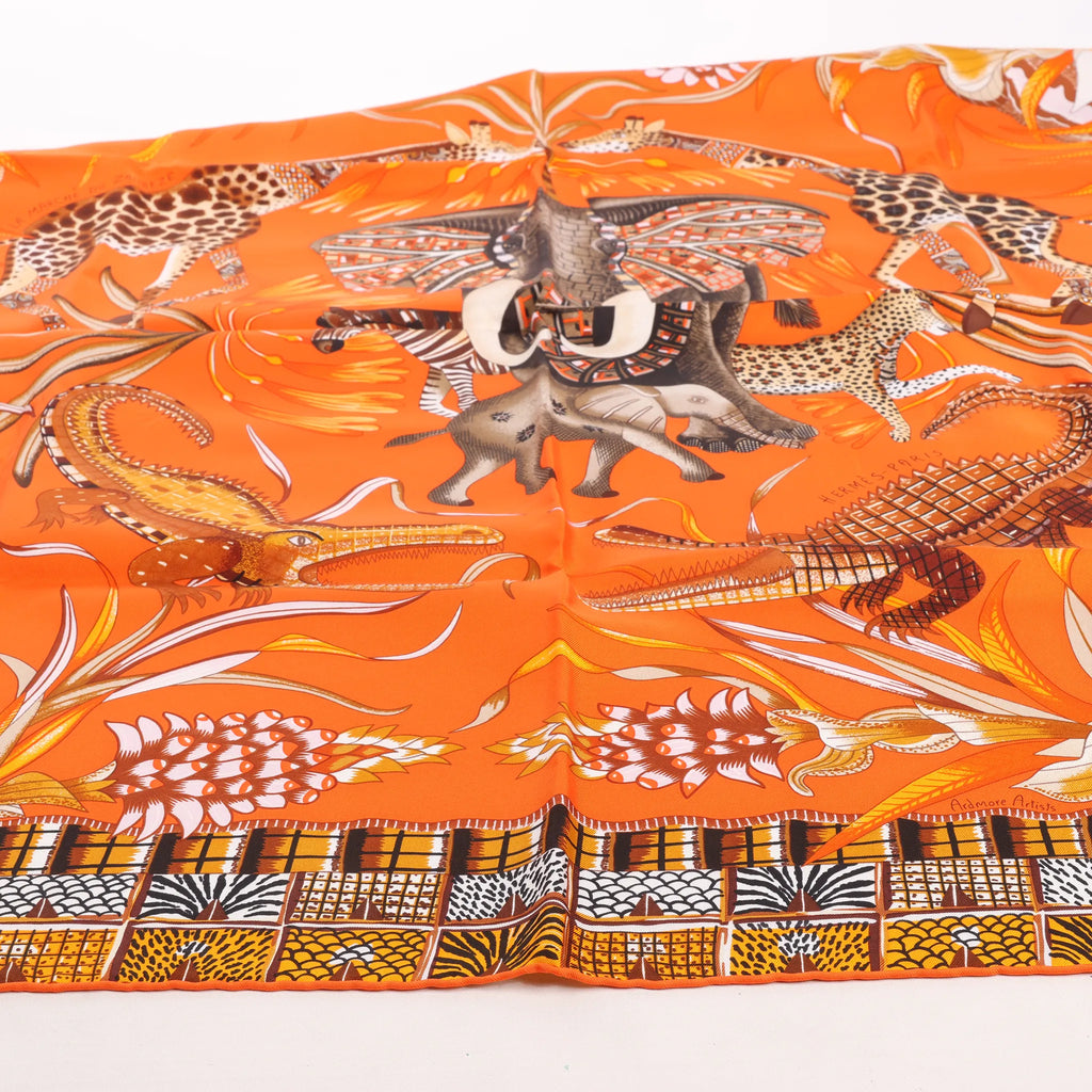 Hermès Carré 90 "LA MARCHE Du ZAMBEZE" Silk handkerchief in Orange