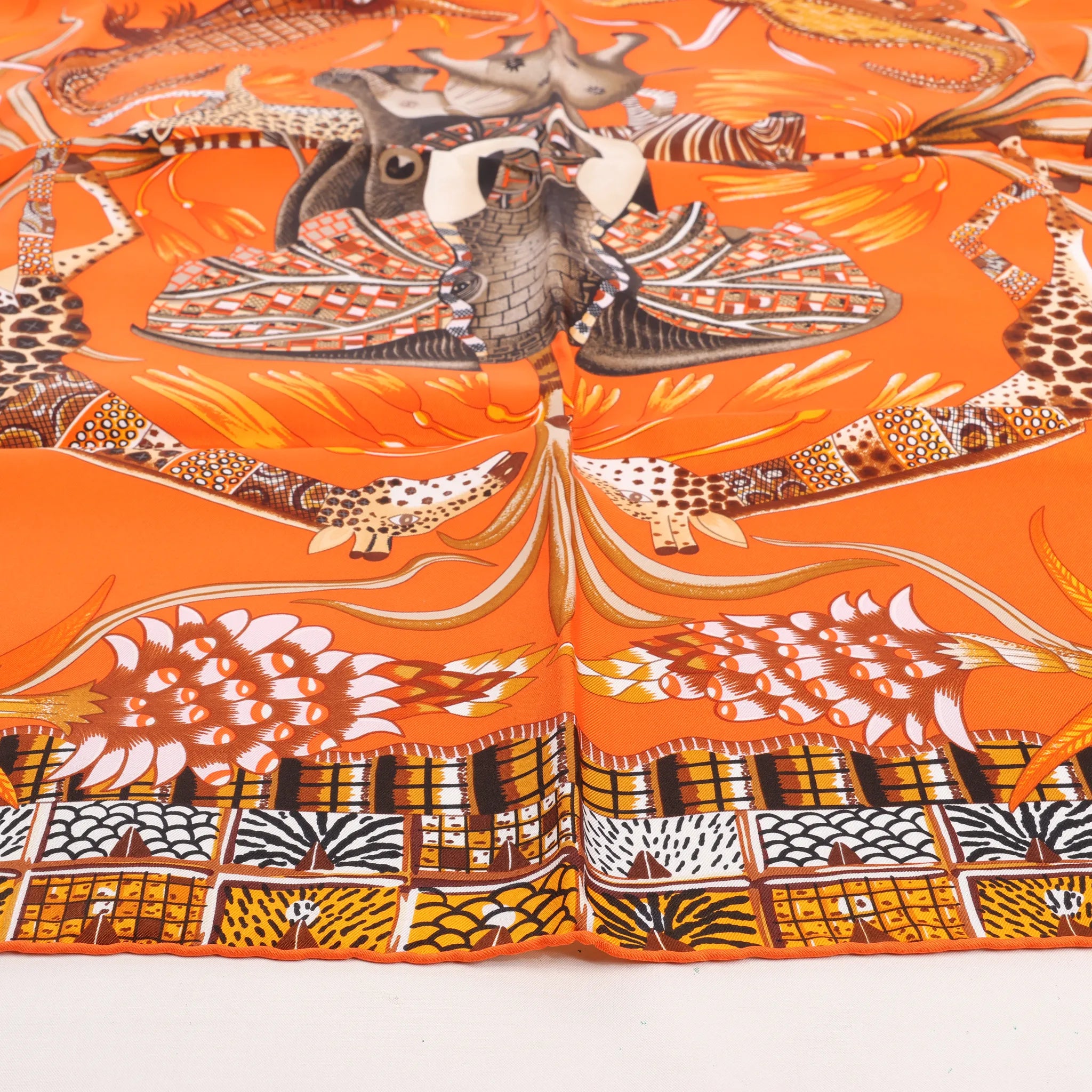 Hermès Carré 90 "LA MARCHE Du ZAMBEZE" Silk handkerchief in Orange