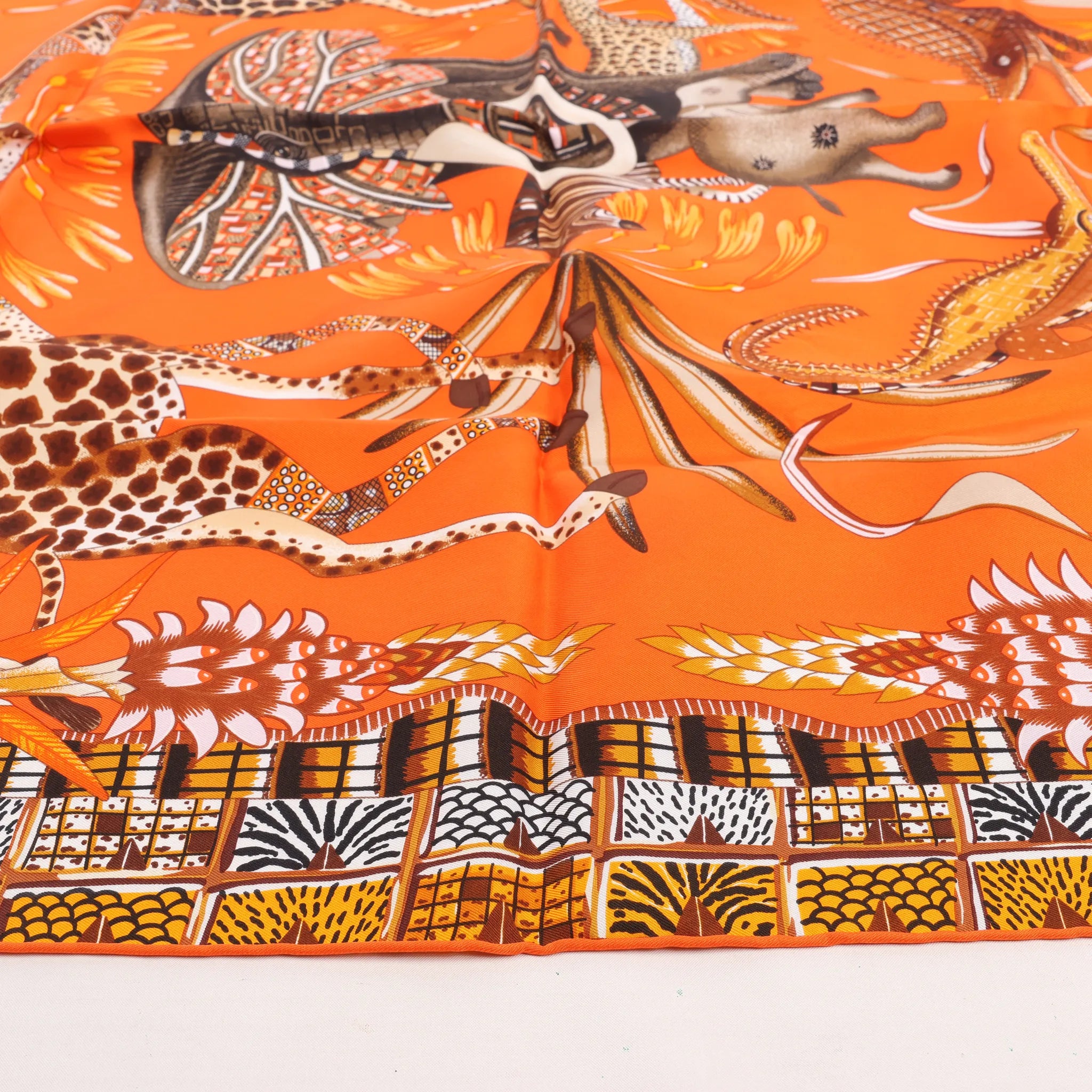 Hermès Carré 90 "LA MARCHE Du ZAMBEZE" Silk handkerchief in Orange