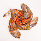 Hermès Carré 90 "LA MARCHE Du ZAMBEZE" Silk handkerchief in Orange