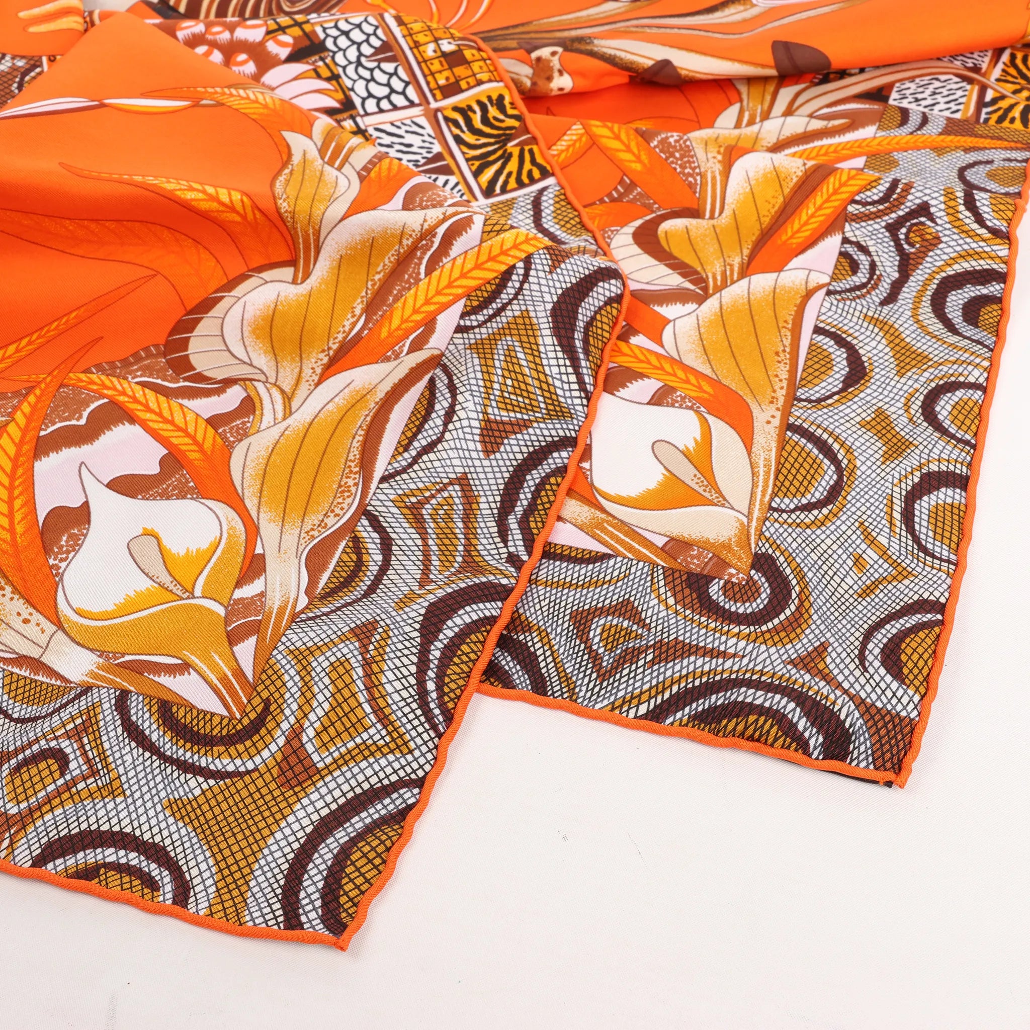 Hermès Carré 90 "LA MARCHE Du ZAMBEZE" Silk handkerchief in Orange
