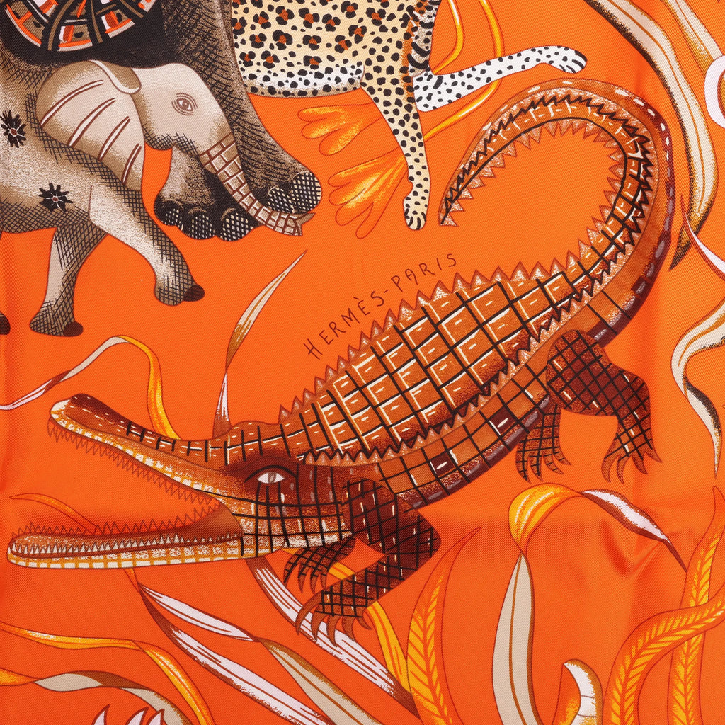 Hermès Carré 90 "LA MARCHE Du ZAMBEZE" Silk handkerchief in Orange