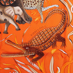 Hermès Carré 90 "LA MARCHE Du ZAMBEZE" Silk handkerchief in Orange