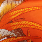 Hermès Carré 90 "LA MARCHE Du ZAMBEZE" Silk handkerchief in Orange