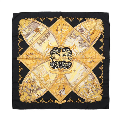 Hermès Carré 90 "La Vie à Cheval" silk scarf in black and yellow featuring detailed equestrian-themed illustrations framed by a bold black border.