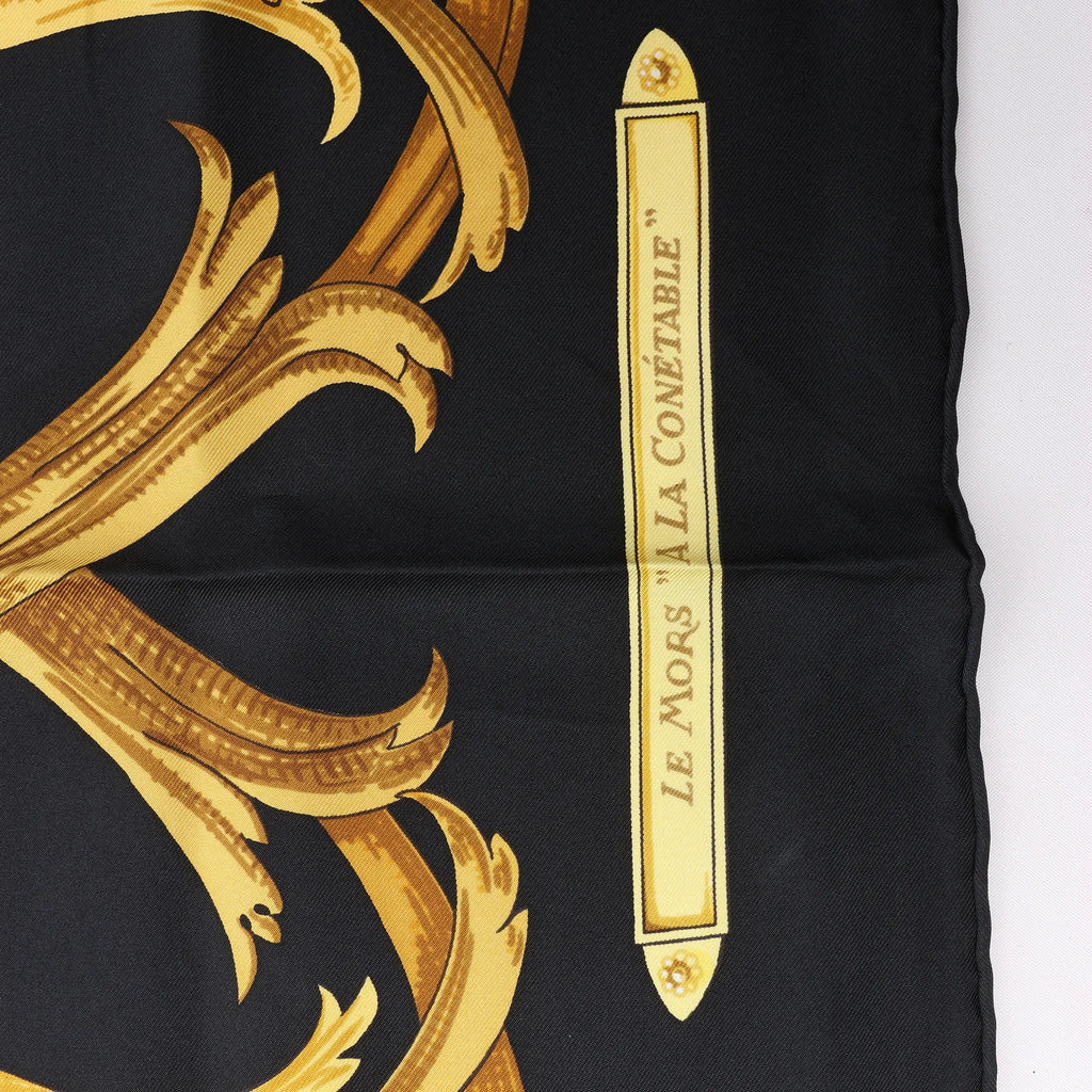 Hermès Carré 90 "LE MORS A LA CONETABLE" Silk handkerchief in Black x Gold