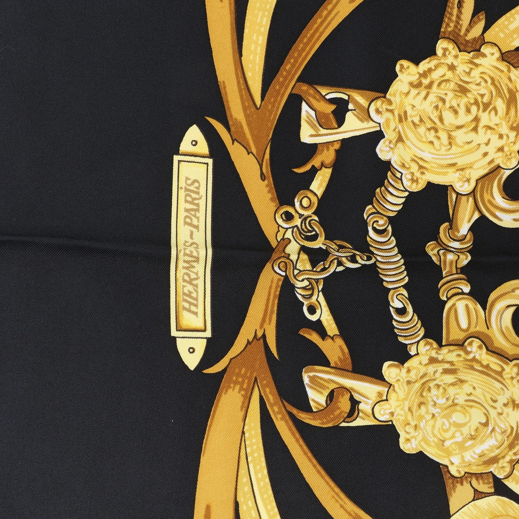 Hermès Carré 90 "LE MORS A LA CONETABLE" Silk handkerchief in Black x Gold