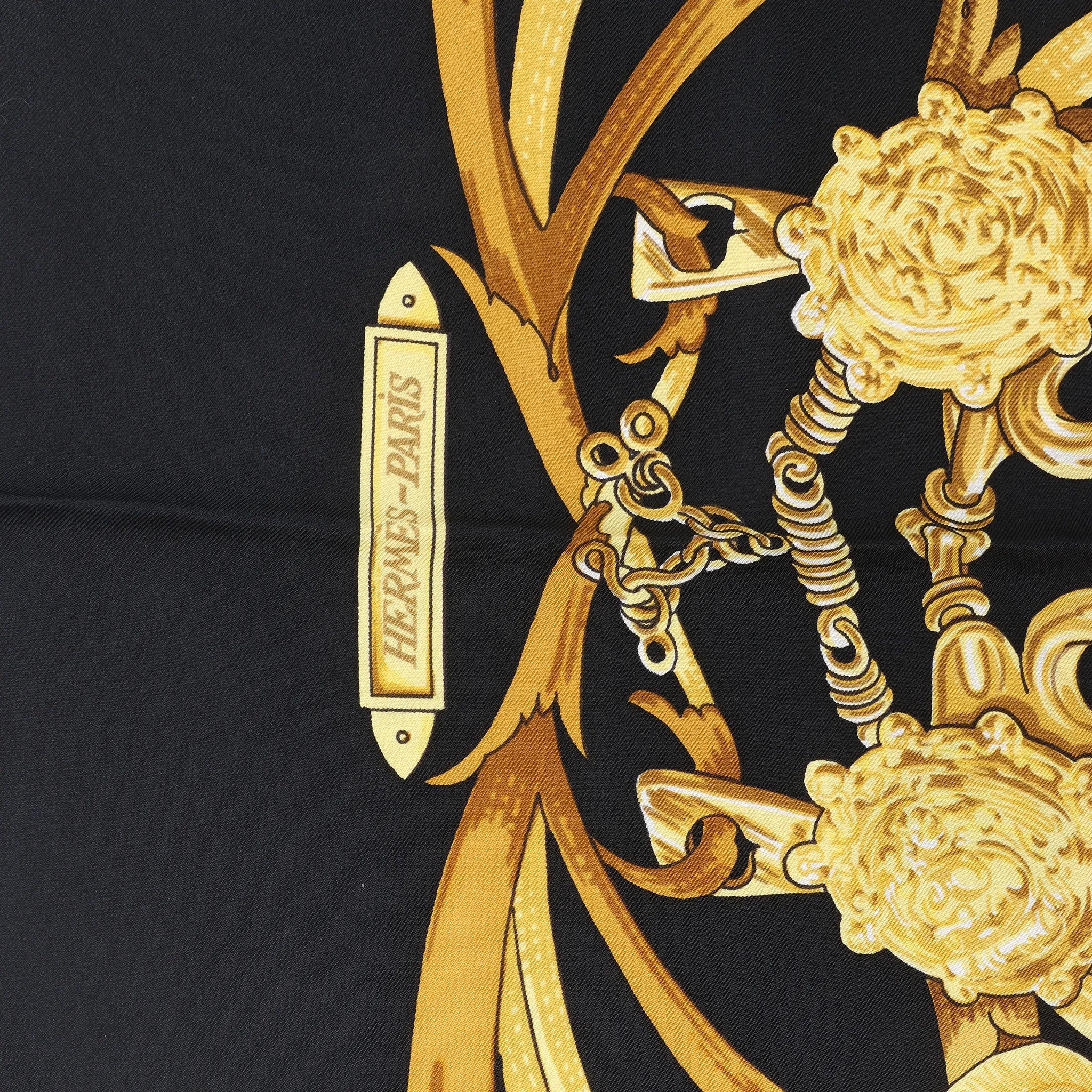 Hermès Carré 90 "LE MORS A LA CONETABLE" Silk handkerchief in Black x Gold