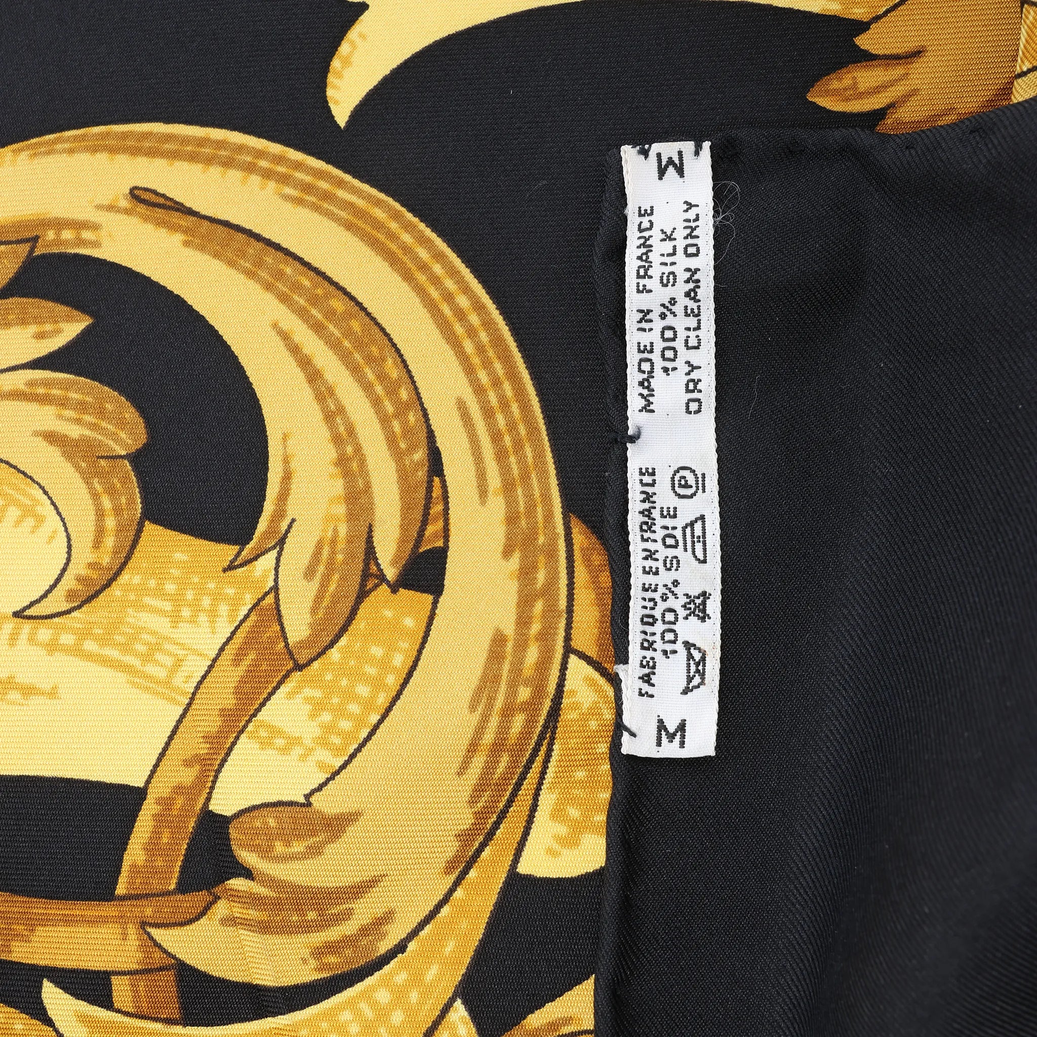 Hermès Carré 90 "LE MORS A LA CONETABLE" Silk handkerchief in Black x Gold