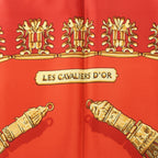 Hermès Carré 90 "LES CAVALIERS D'OR" Silk handkerchief in Red