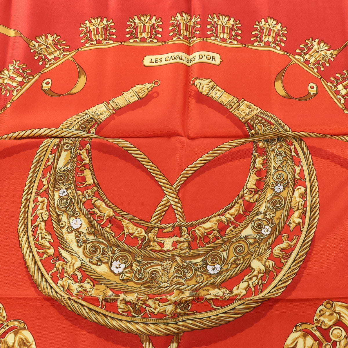 Hermès Carré 90 "LES CAVALIERS D'OR" Silk handkerchief in Red
