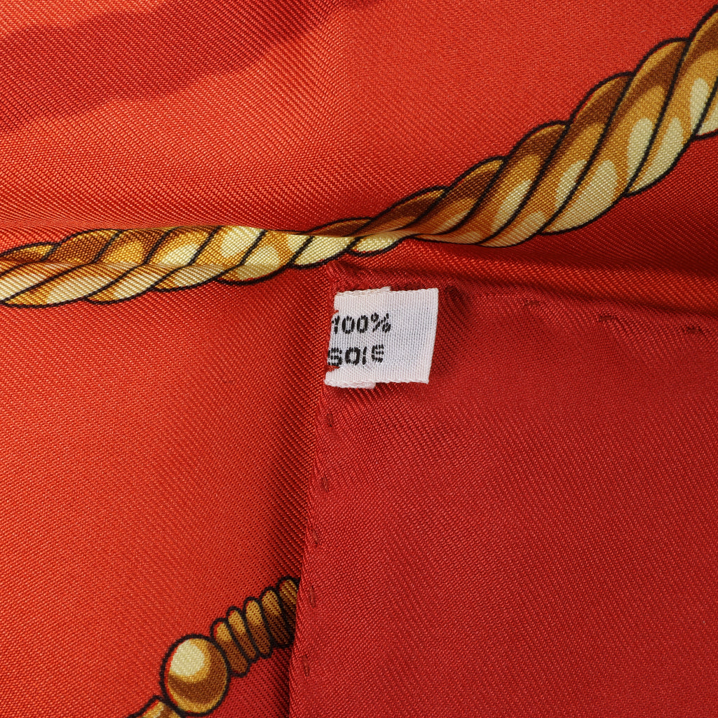 Hermès Carré 90 "LES CAVALIERS D'OR" Silk handkerchief in Red