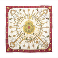 Hermès Carré 90 burgundy and ivory silk scarf with ornate gold key motifs, green tassels, a central circular medallion and burgundy border.