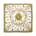 Hermès Carré 90 olive green and ivory silk scarf with ornate gold key motifs, green tassels, a central medallion and green border.