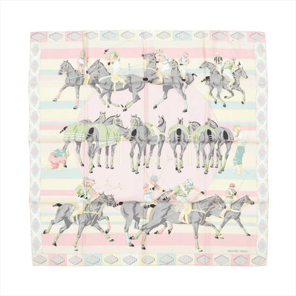 Hermès Carré 90 "Les Poneys de Polo" silk scarf in pink with a multicolor equestrian polo motif, featuring horses and riders in motion, surrounded by pastel stripes and a decorative border.