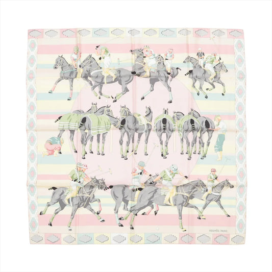 Hermès Carré 90 "Les Poneys de Polo" silk scarf in pink with a multicolor equestrian polo motif, featuring horses and riders in motion, surrounded by pastel stripes and a decorative border.
