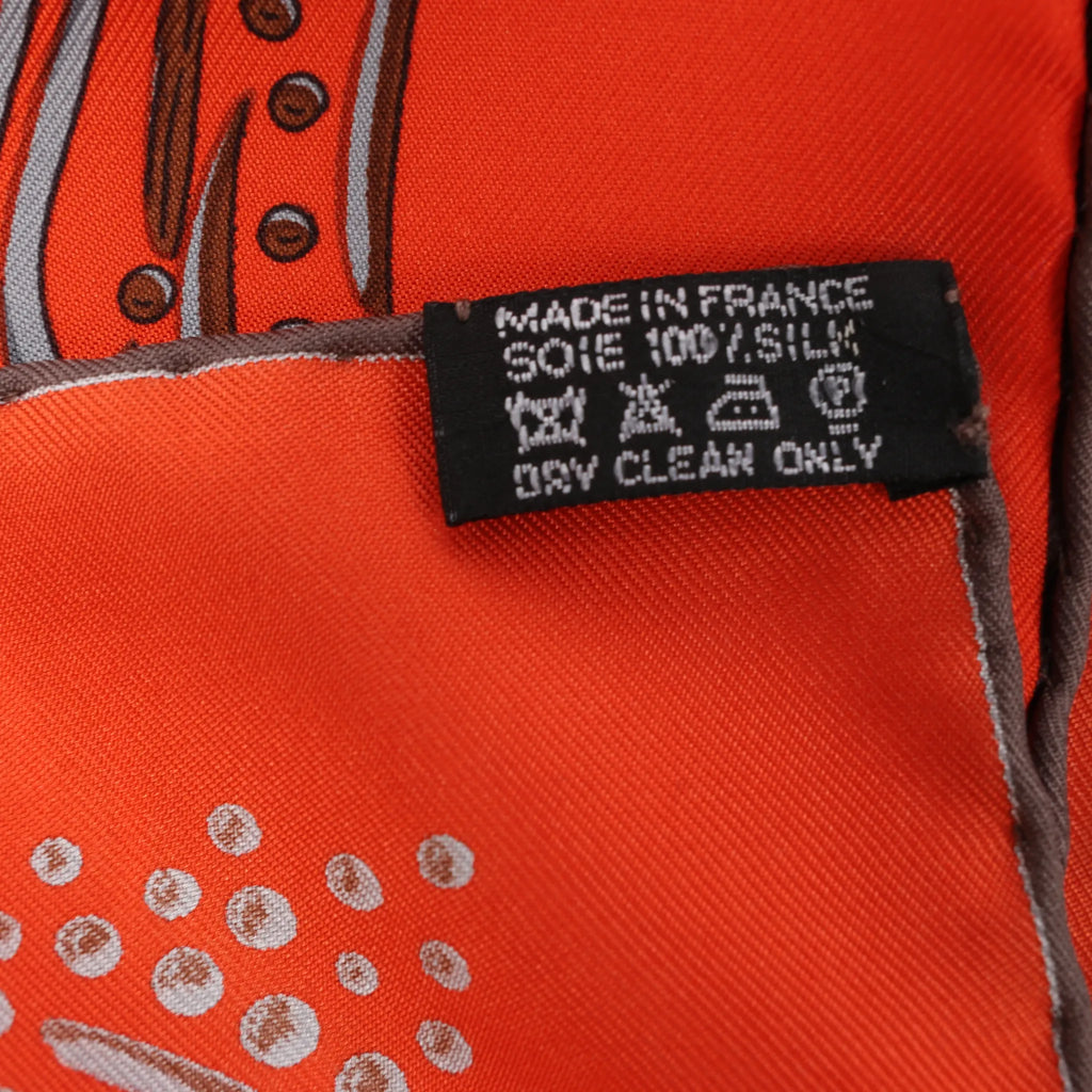 Hermès Carré 90 "LES RIVIERES DE BABEL" Silk handkerchief in Orange