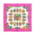 Hermès Carré 90 “Les Rubans du Cheval” silk scarf in pink with ivory center, ornate gold frame, and multicolor ribbon bow motifs.