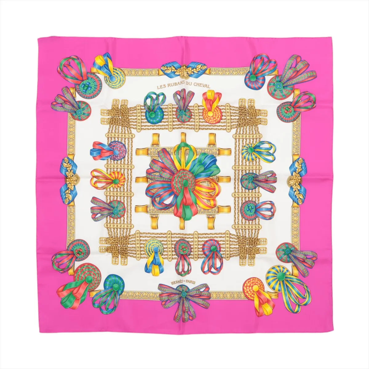 Hermès Carré 90 “Les Rubans du Cheval” silk scarf in pink with ivory center, ornate gold frame, and multicolor ribbon bow motifs.