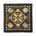 Hermès Carré 90 "Les Tambours" silk scarf in black featuring detailed illustrations of drums, tassels, ropes, and gold accents arranged in a symmetrical design with "Hermès-Paris" text.