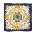 Hermès Carré 90 “Lunapark” silk scarf with navy border and central ornate carousel wheel design featuring horses, gold details, and multicolor ribbons.