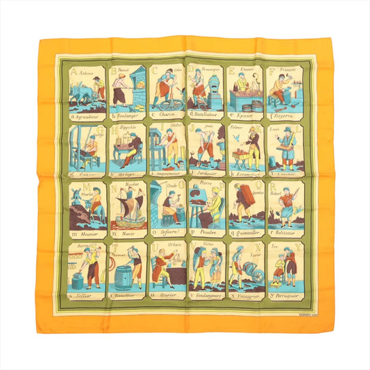 Hermès Carré 90 "L'Alphabet des Métiers" silk scarf in orange featuring illustrated alphabet blocks, each with a different traditional French profession, framed by a bold orange border.