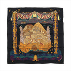 Hermès Carré 90 black silk scarf with gold illustrated city scene, ornate gold column border, and multicolor decorative band along the bottom edge.