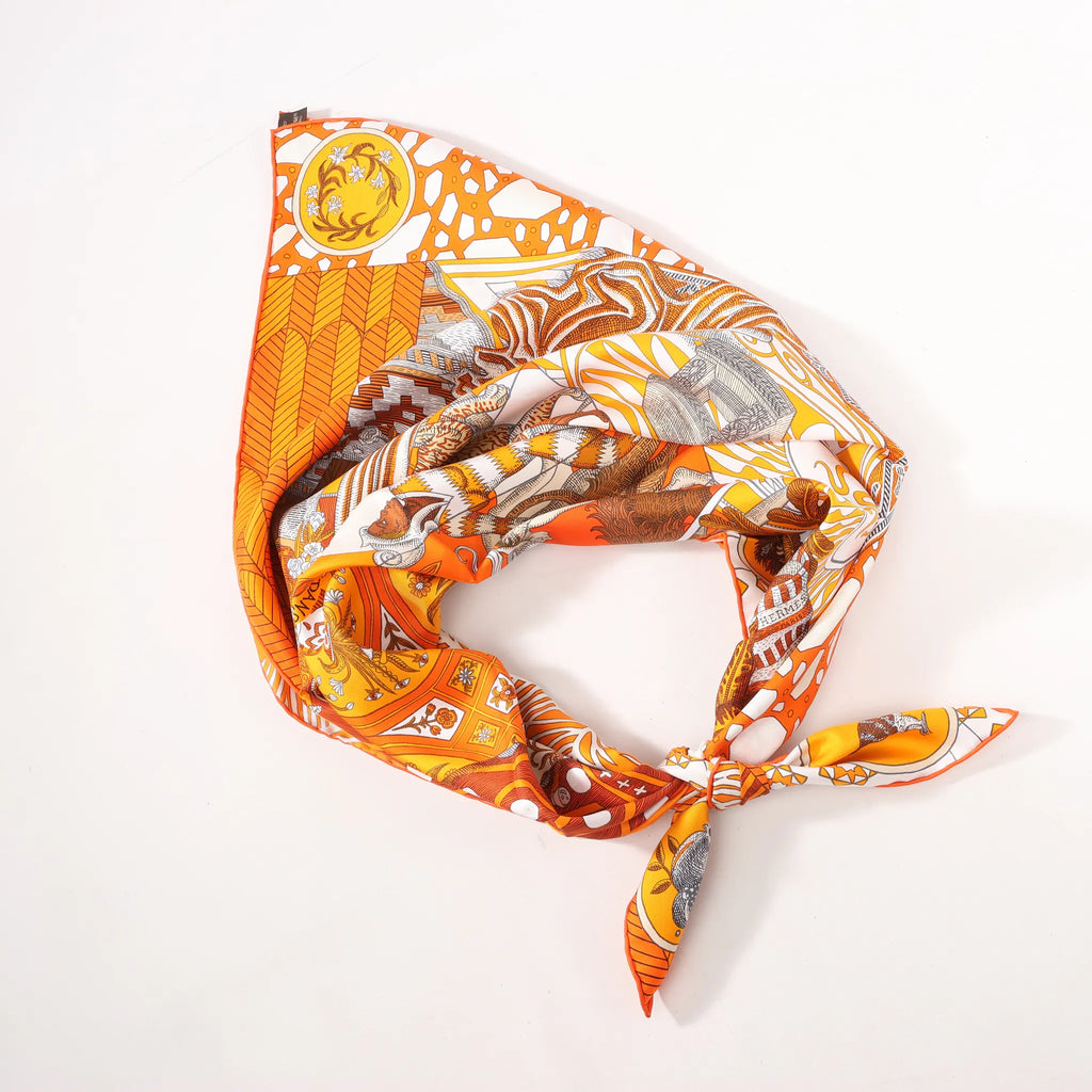 Hermès Carré 90 "La Danse des Amazones" Silk handkerchief in Orange