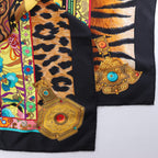 Hermès Carré 90 "La femme aux semelles de vent" Silk handkerchief in Brown x Black